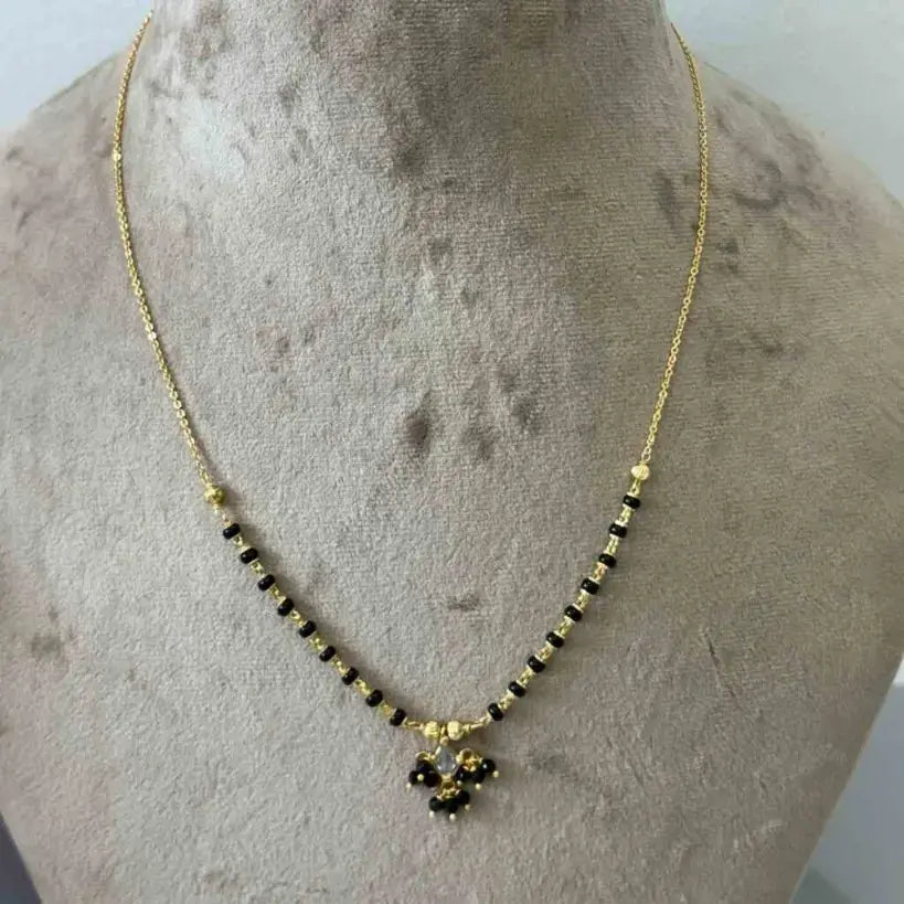 HK0087 Black Beads Centerd with Black CZ Bunches