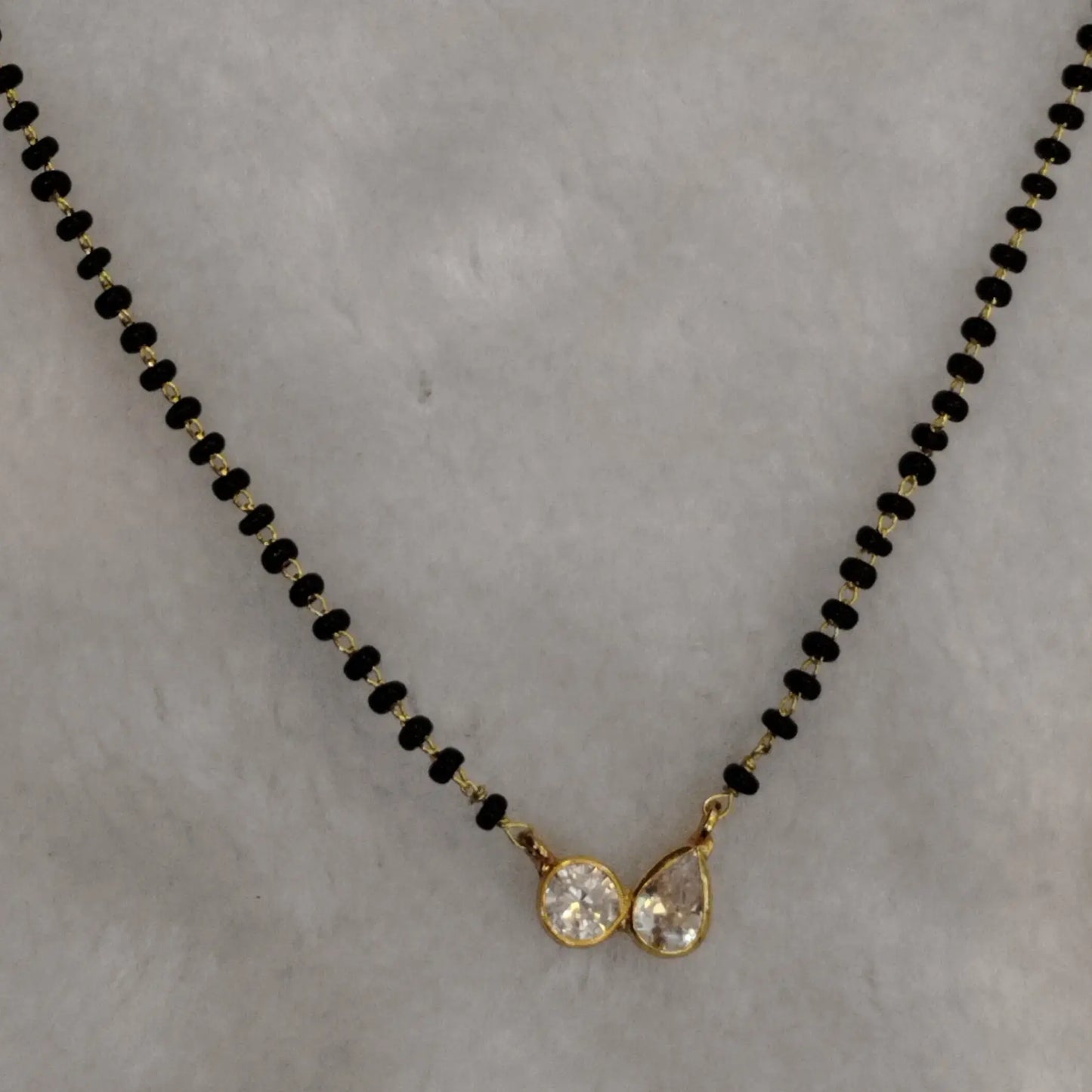 HK0292 – Contemporary Black Bead Mangalsutra Chain with Dual-Tone Pendant