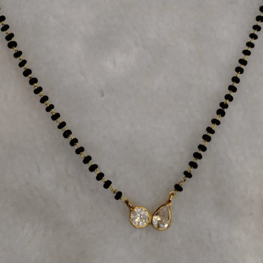 HK0292 – Contemporary Black Bead Mangalsutra Chain with Dual-Tone Pendant