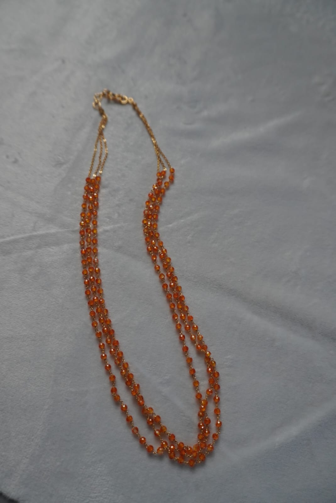 orange color 3 line beads chain