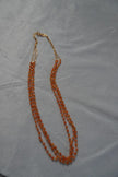 orange color 3 line beads chain