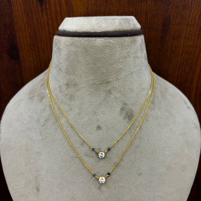 HK0271 – Graceful Black Bead Mangalsutra with Elegant Pendant